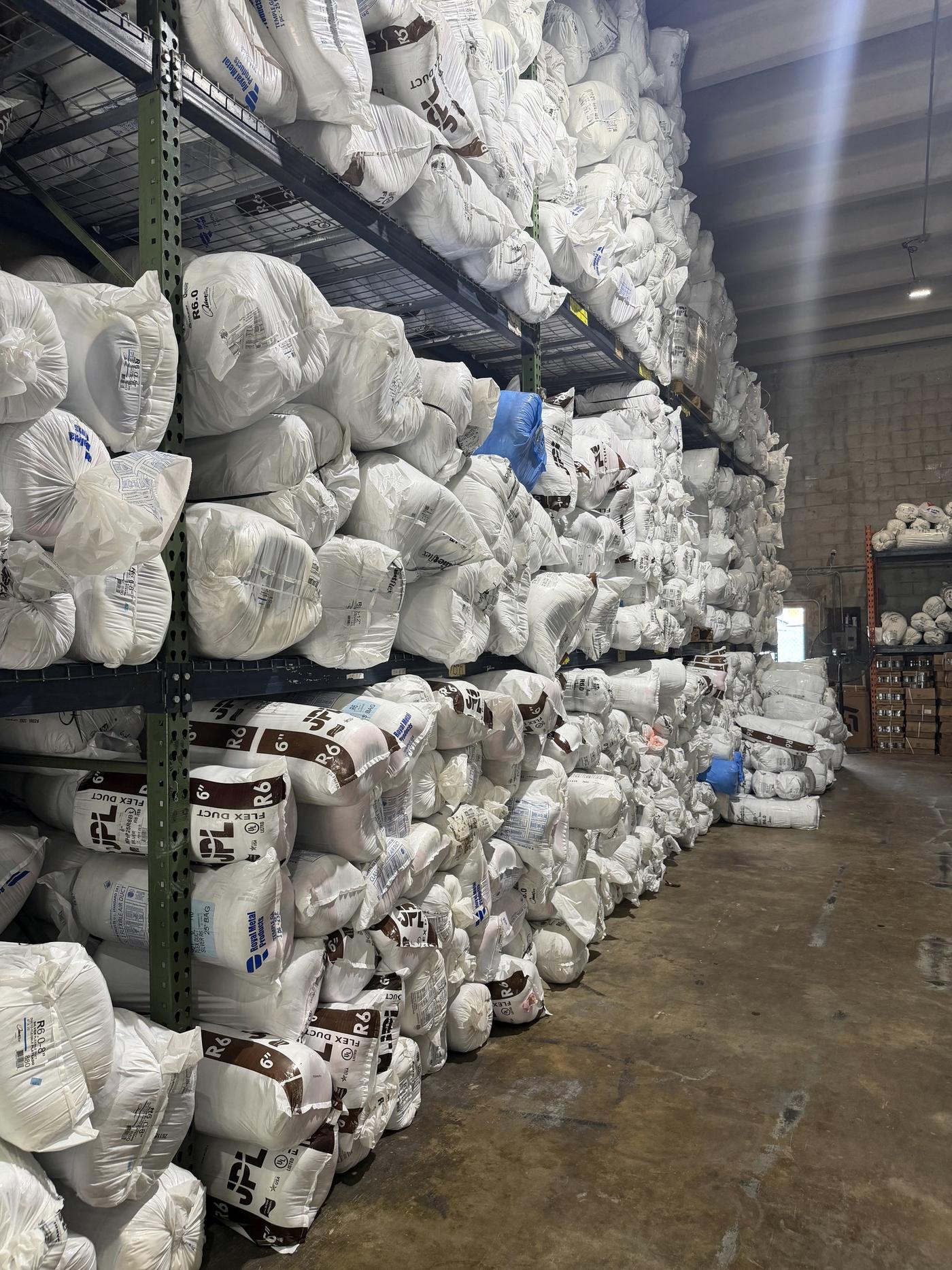 Racks of insulated flexible duct at the Banos HVAC warehouse