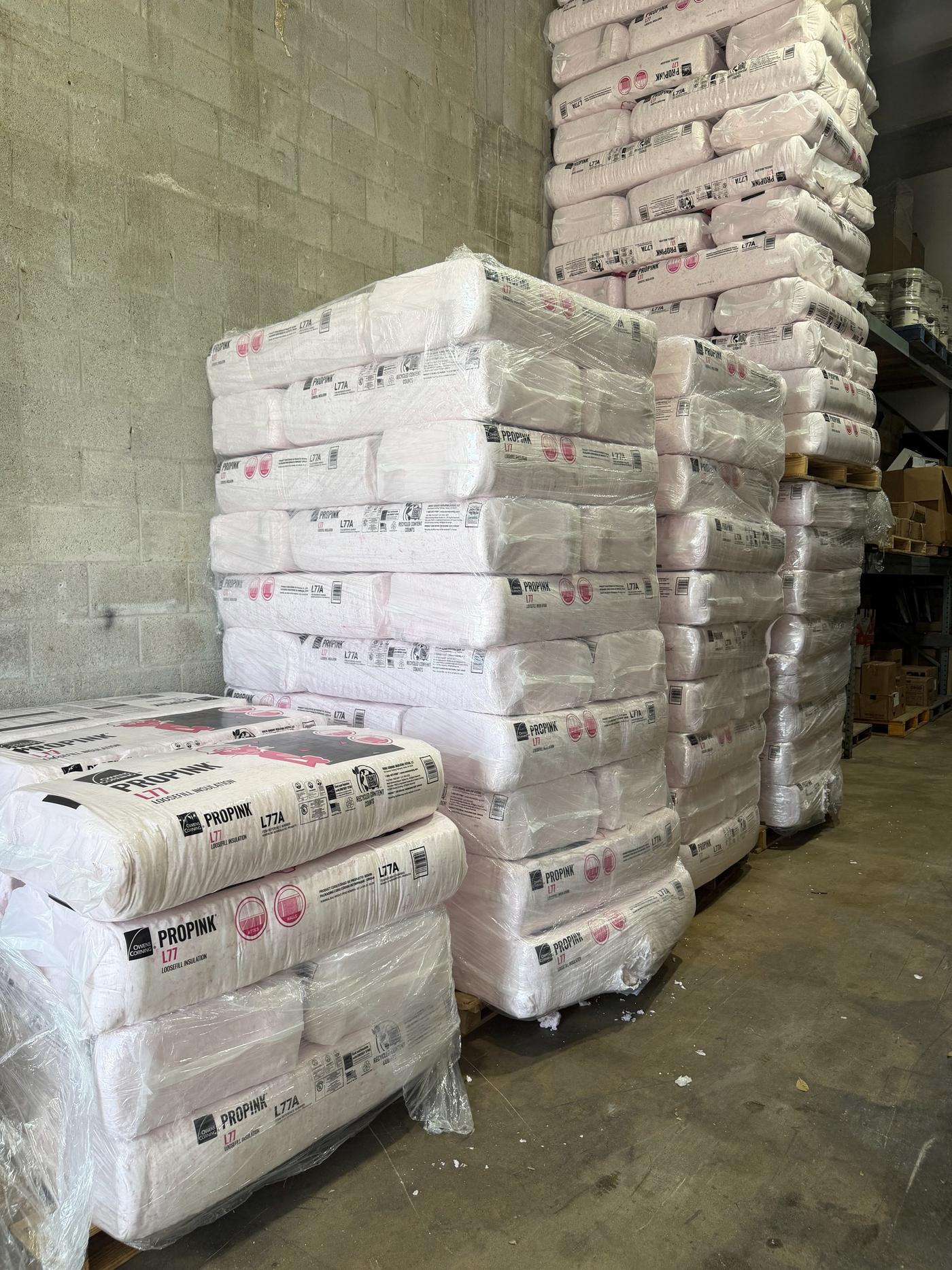 Pallets of blown-in attic insulation stocked at Banos HVAC Supply