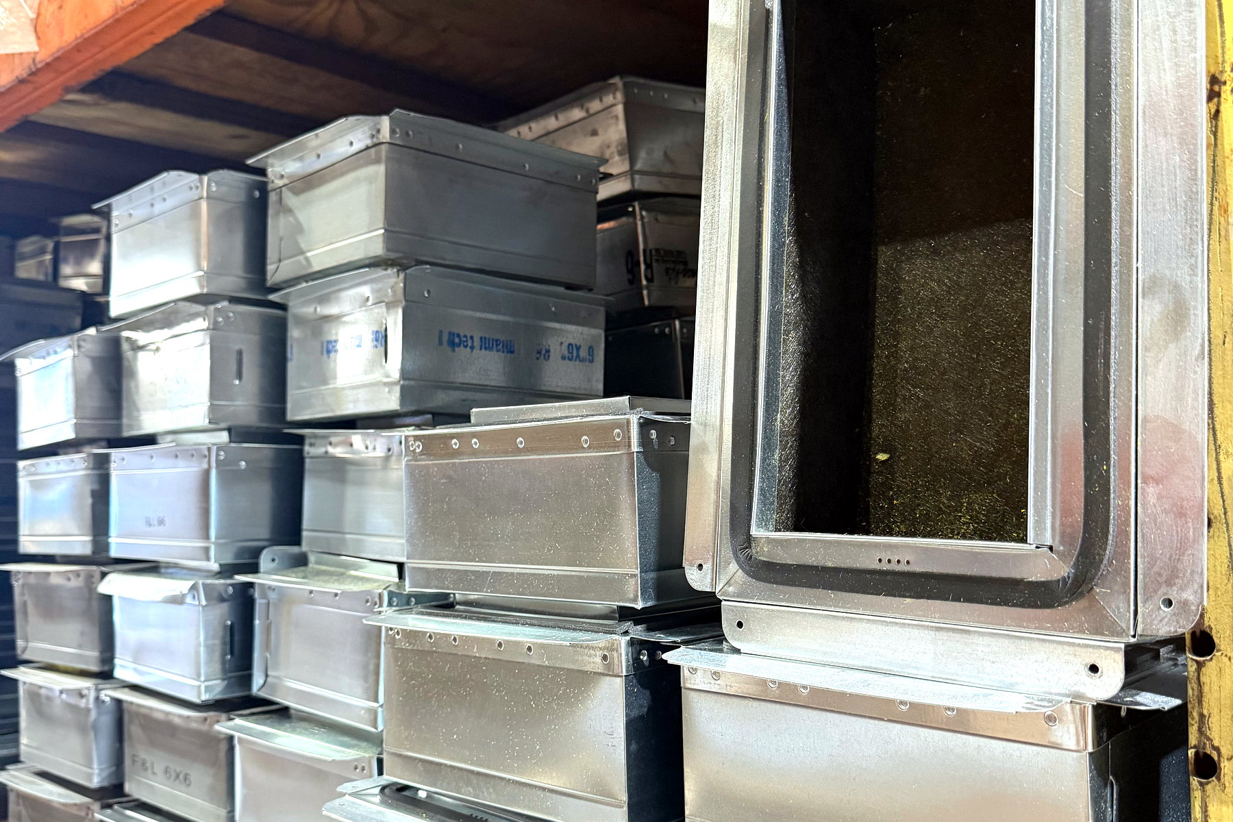 Custom insulated sheet metal plenum fabricated in-house at Banos HVAC